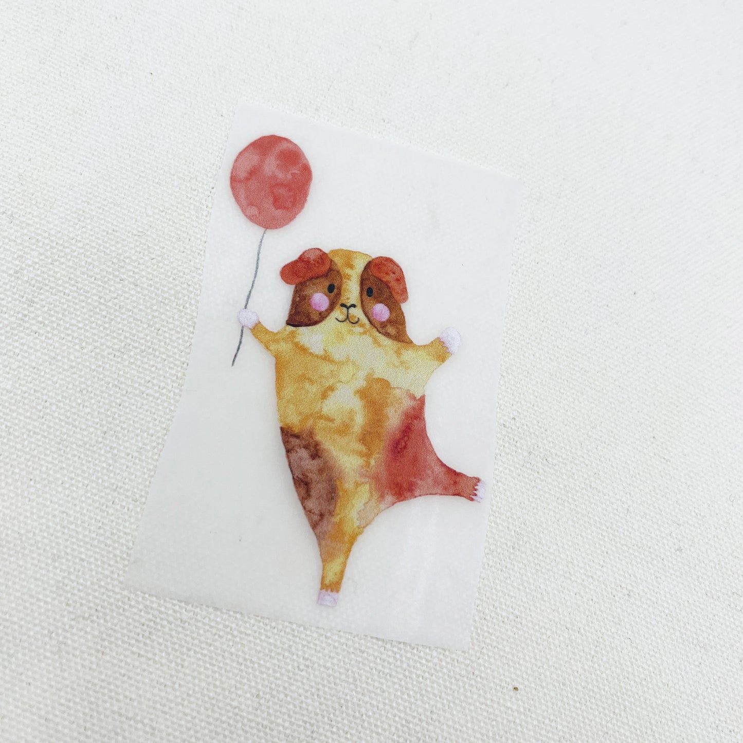 Bügelbild: Meerschweinchen mit Luftballon